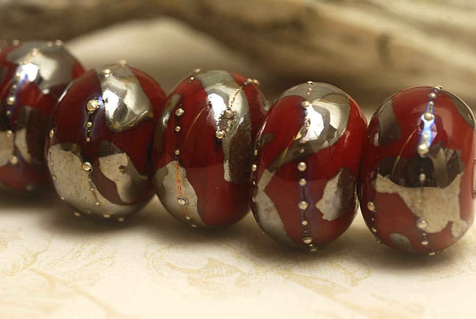 10704201 - Seven Regal Red Metallic Rondelle Beads