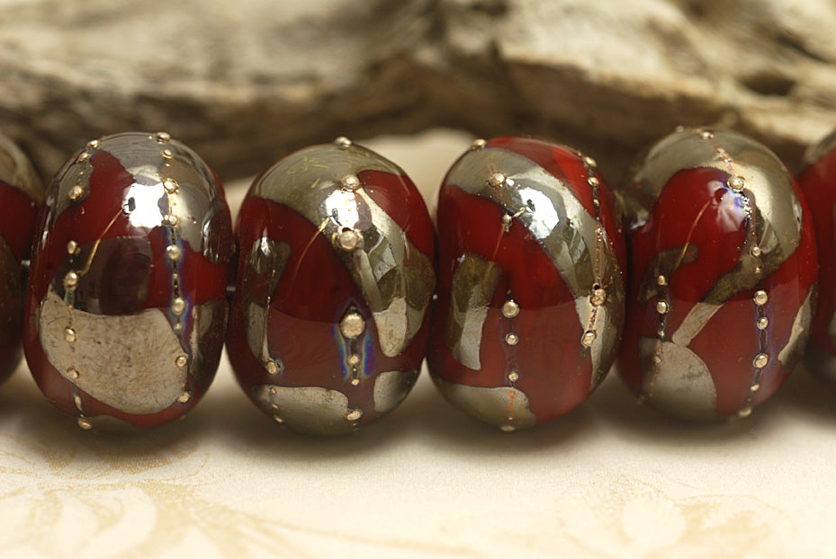 10704201 - Seven Regal Red Metallic Rondelle Beads
