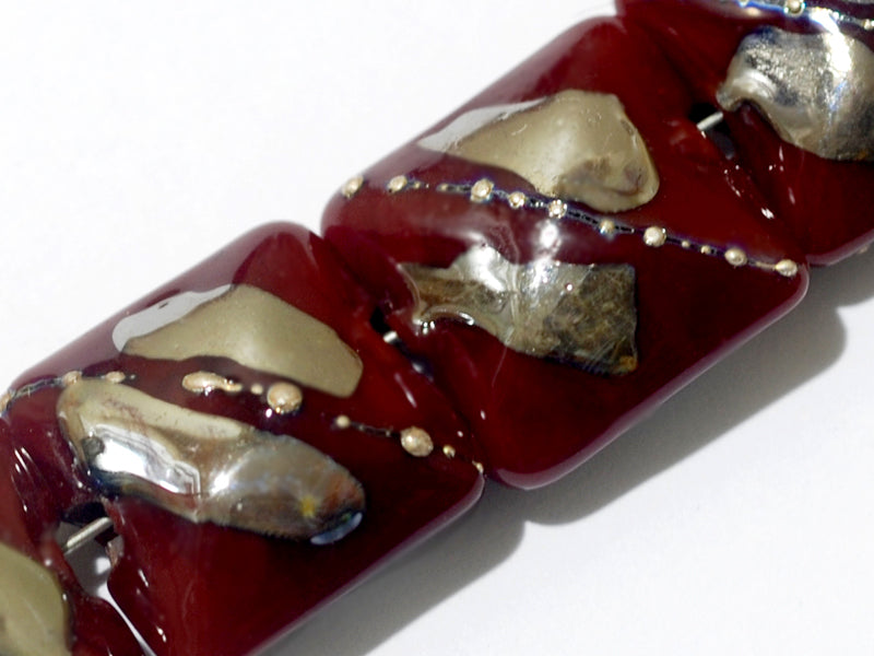 10704214 - Four Regal Red Metallic Pillow Beads