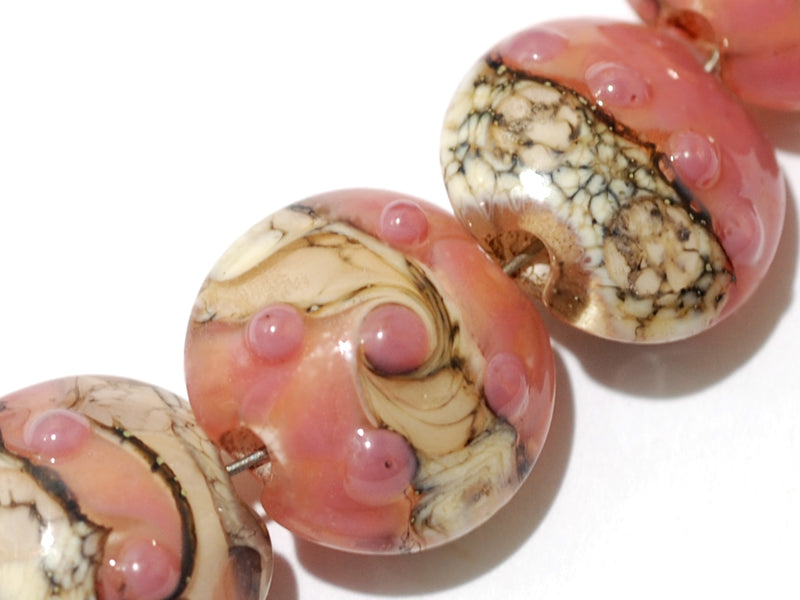 10704302 - Seven Pink/Soft Orange Lentil Beads