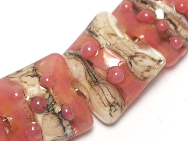 10704304 - Seven Pink/Soft Orange Pillow Beads