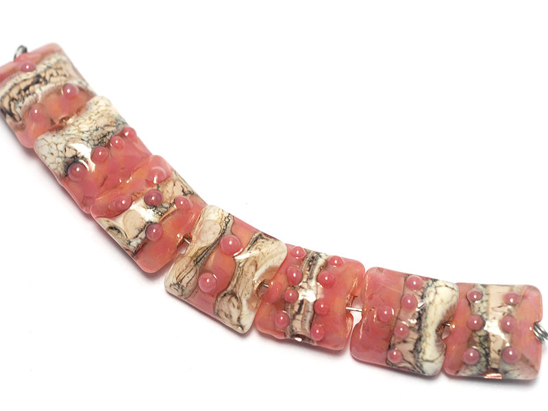 10704304 - Seven Pink/Soft Orange Pillow Beads
