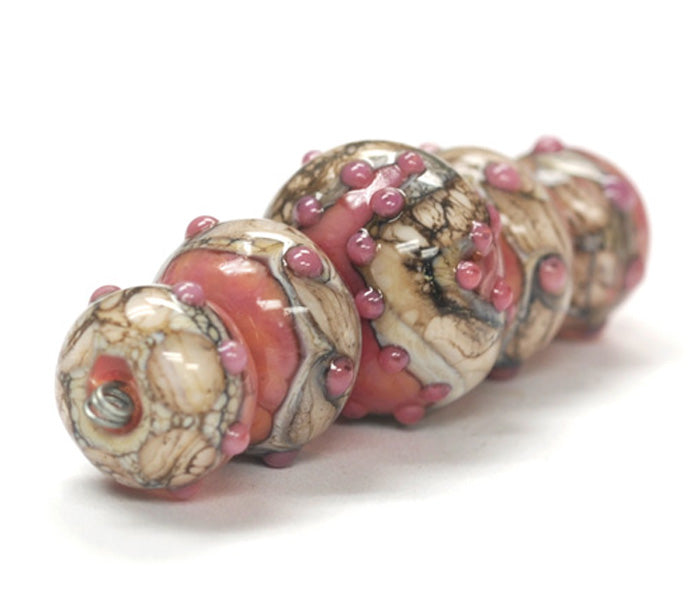 10704311 - Five Graduated Pink/Soft Orange Rondelle Beads
