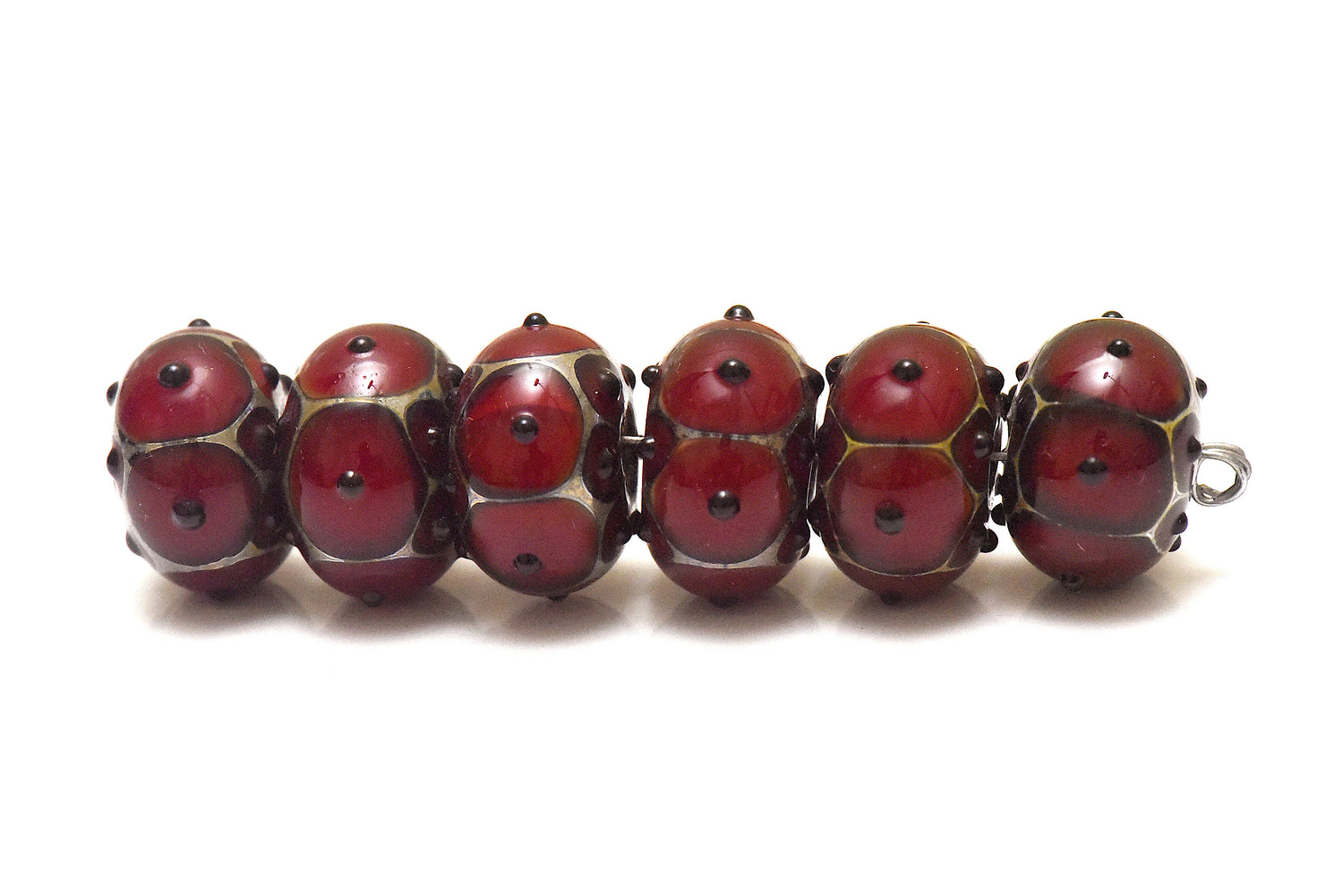 10704401 – Six Red w/Black Metal Dots Rondelle Beads