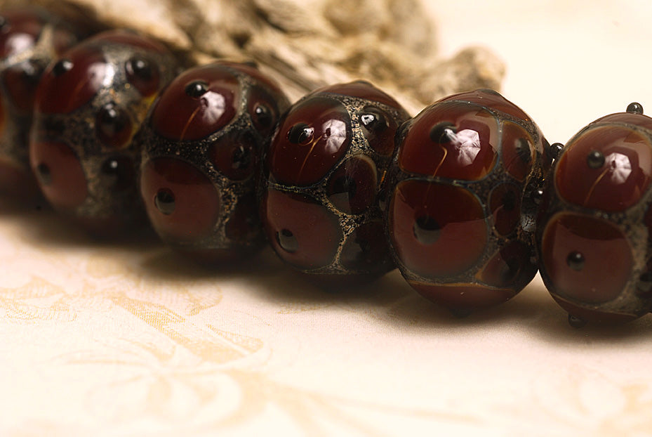 10704421 - Seven Red Rondelle Beads