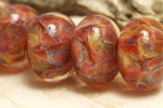 10704501 - Six Orange Rondelle Beads