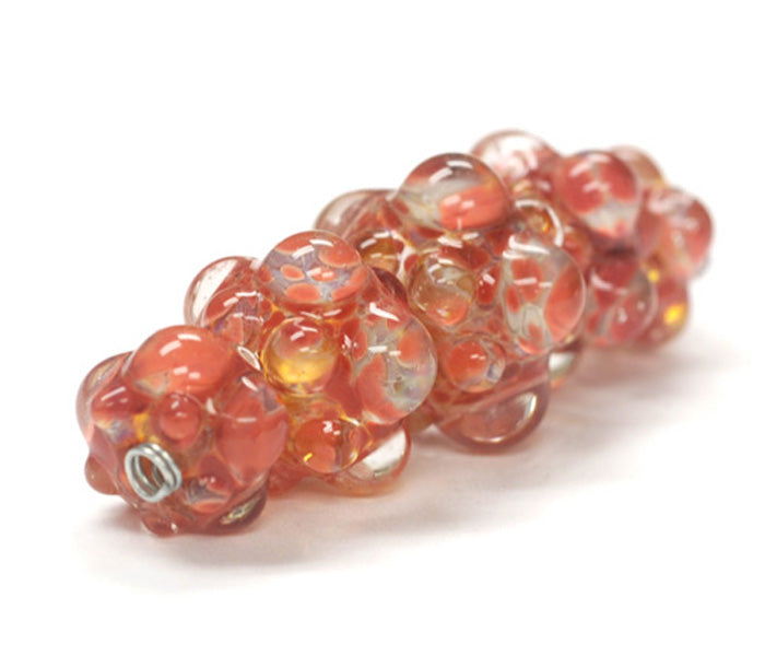 10704611 - Five Graduated Orange Rondelle Beads
