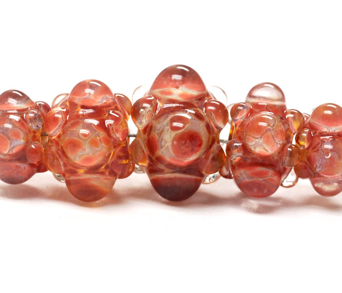 10704611 - Five Graduated Orange Rondelle Beads