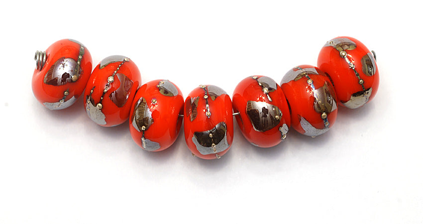 10705001 - Seven Electric Orange Metallic Rondelle Beads