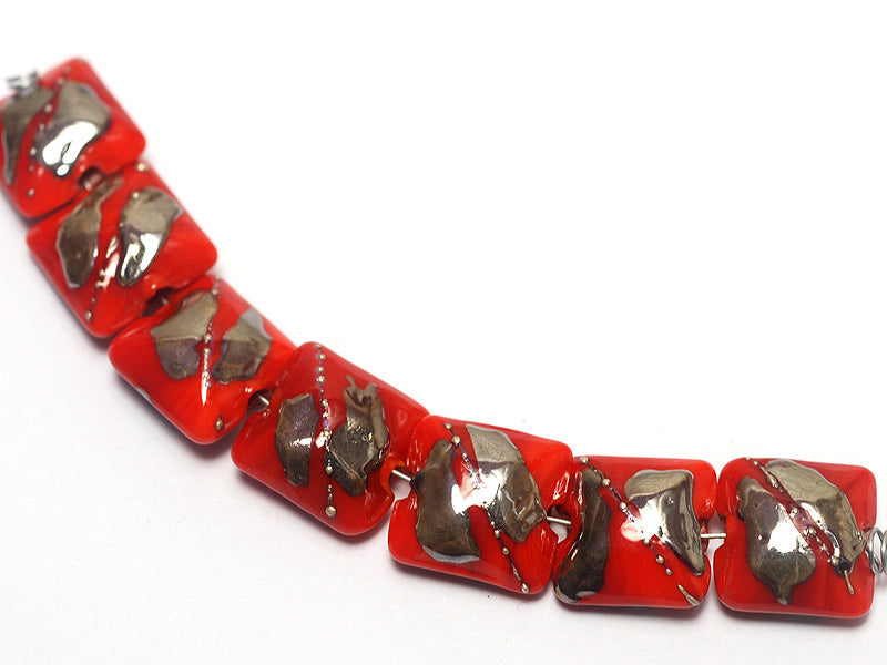 10705004 - Seven Electric Orange Metallic Pillow Beads