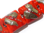 10705014 - Four Electric Orange Metallic Pillow Beads