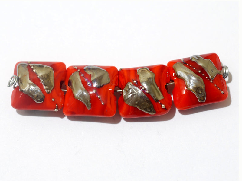 10705014 - Four Electric Orange Metallic Pillow Beads