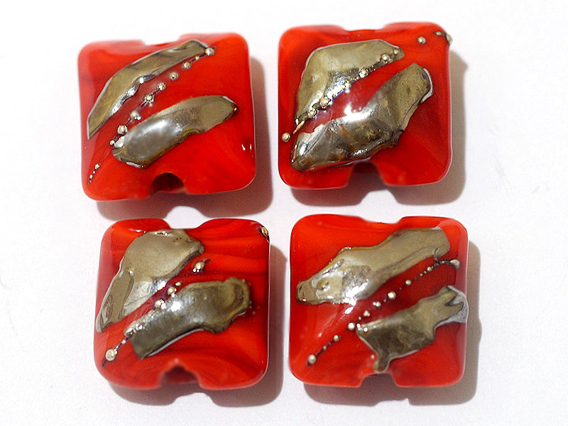 10705014 - Four Electric Orange Metallic Pillow Beads