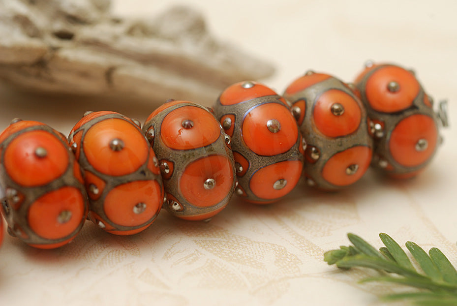 10705201 - Seven Coral w/Metal Dots Rondelle Beads