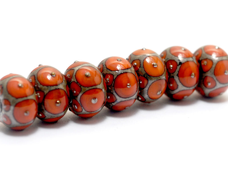 10705201 - Seven Coral w/Metal Dots Rondelle Beads