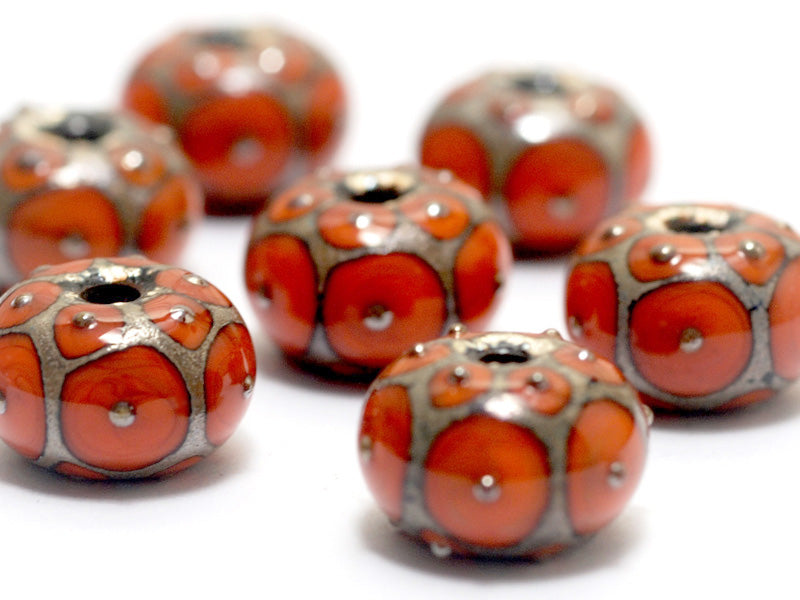 10705201 - Seven Coral w/Metal Dots Rondelle Beads