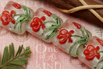 10706114 - Four Crimson Flower Pillow Beads