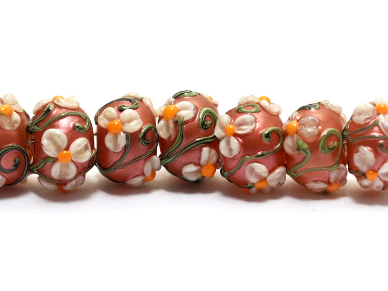10706201 - Seven Ivory Mist Flower on Coral Rondelle Beads