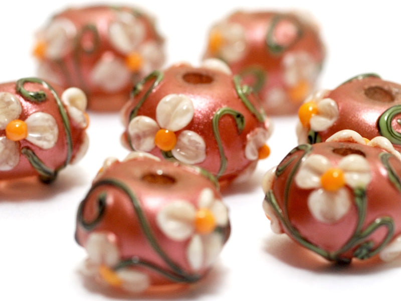 10706201 - Seven Ivory Mist Flower on Coral Rondelle Beads