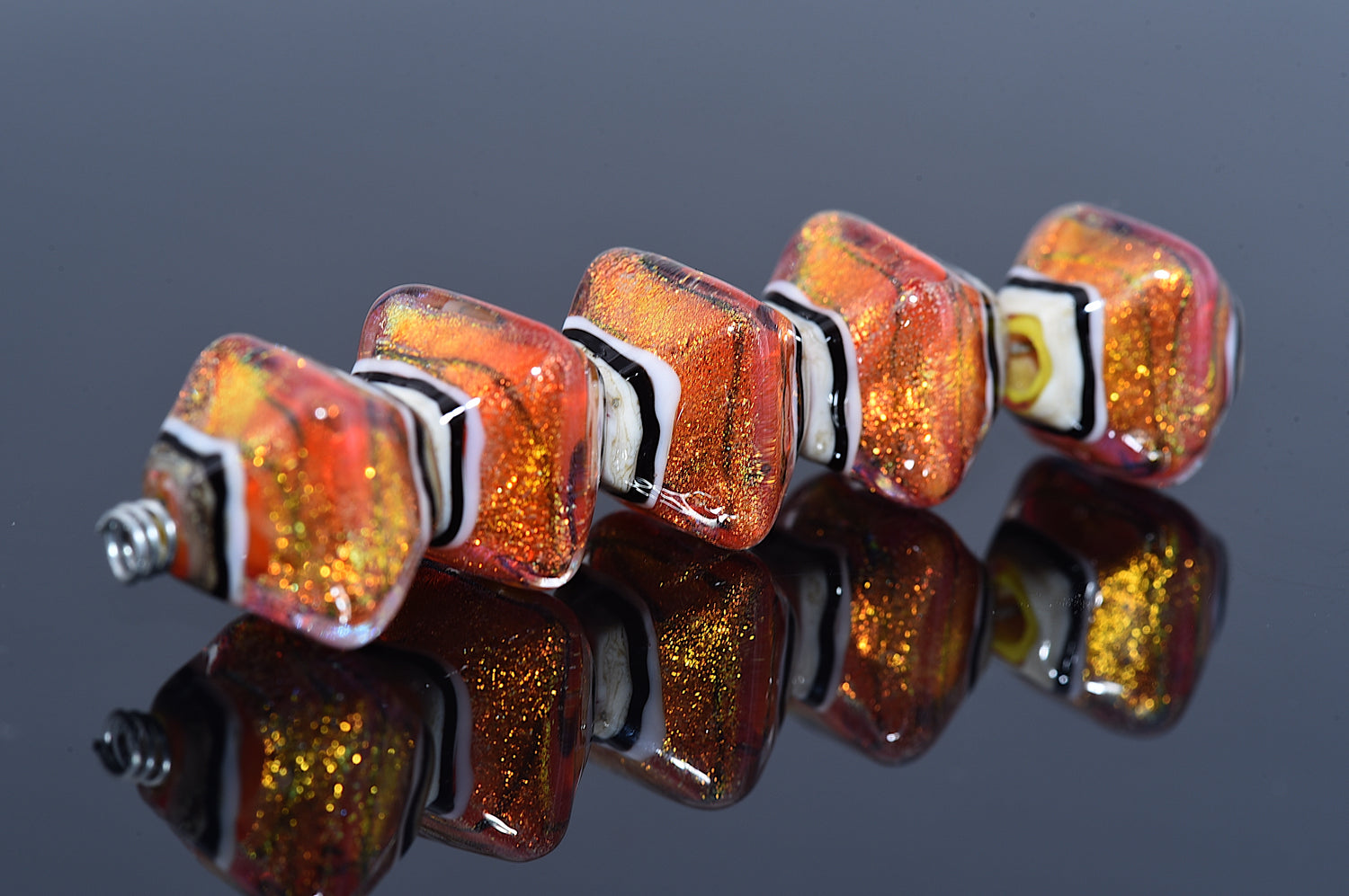 10706807 – Five Orange Dichroic Crystal Beads