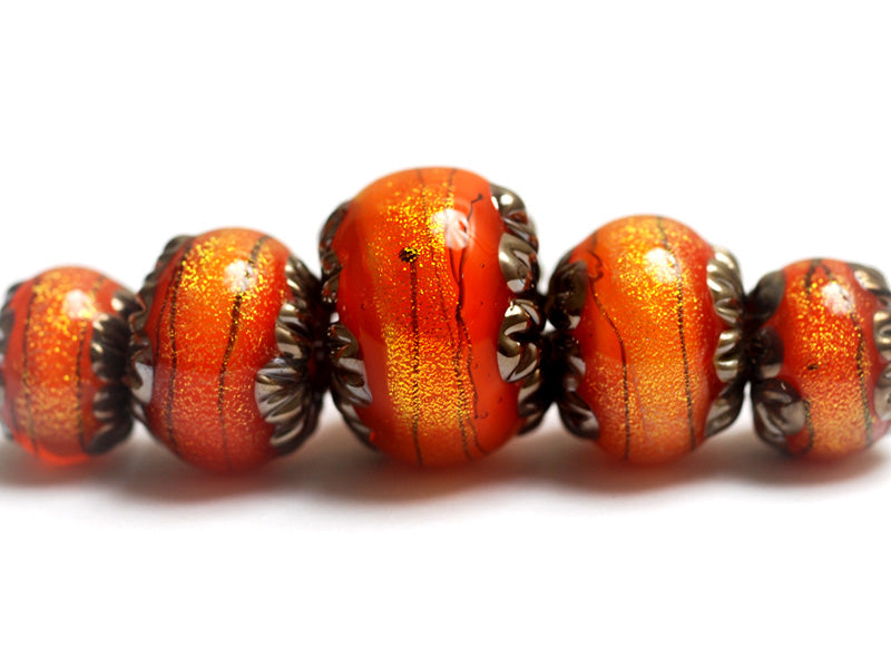 10706811 - Five Bonfire Shimmer Graduated Rondelle Beads