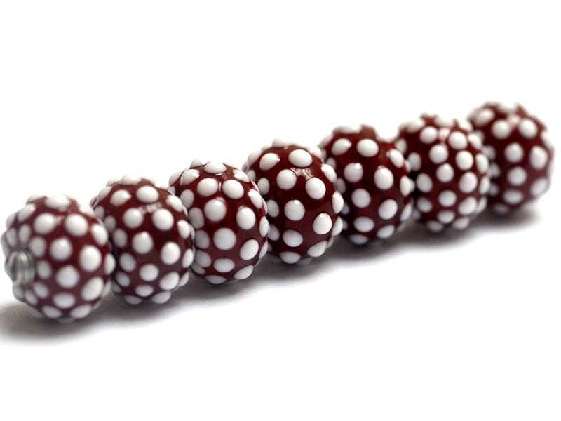 10707101 - Seven Polka Dots on Burgundy Rondelle Beads