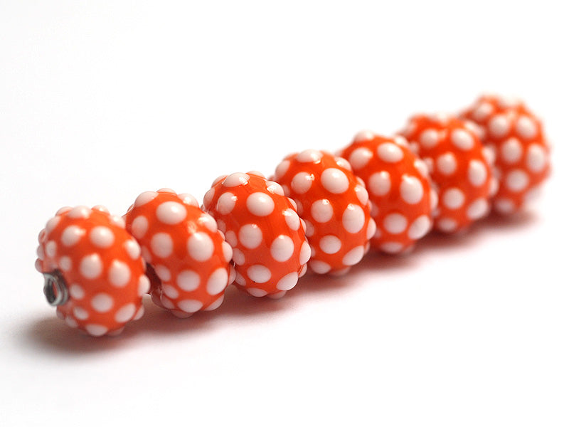10707301 - Seven Polka Dots on Tangerine Rondelle Beads