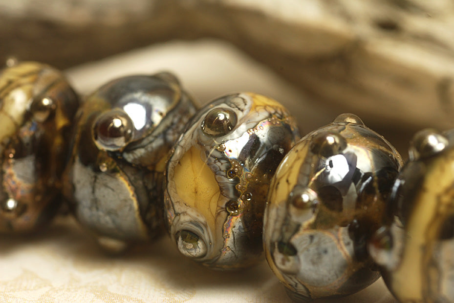 10800801 - Seven Black w/Yellow Silver Foil Rondelle Beads