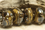 10800801 - Seven Black w/Yellow Silver Foil Rondelle Beads