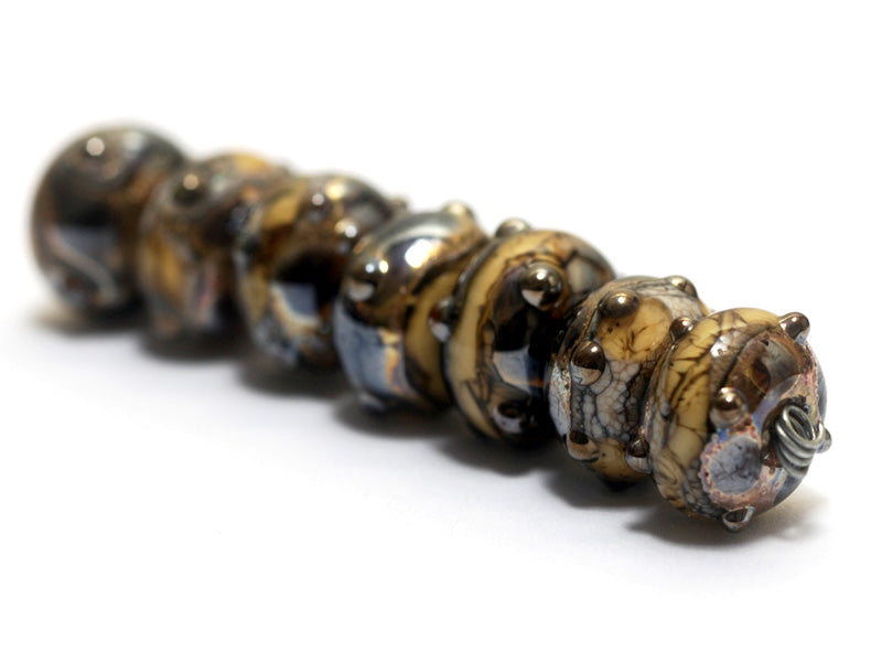 10800801 - Seven Black w/Yellow Silver Foil Rondelle Beads