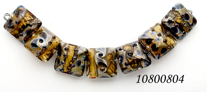 10800804 - Seven Black w/Yellow Silver Foil Pillow Beads