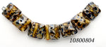 10800804 - Seven Black w/Yellow Silver Foil Pillow Beads