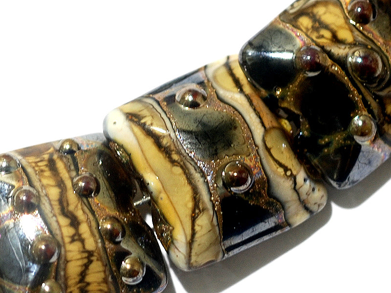 10800804 - Seven Black w/Yellow Silver Foil Pillow Beads