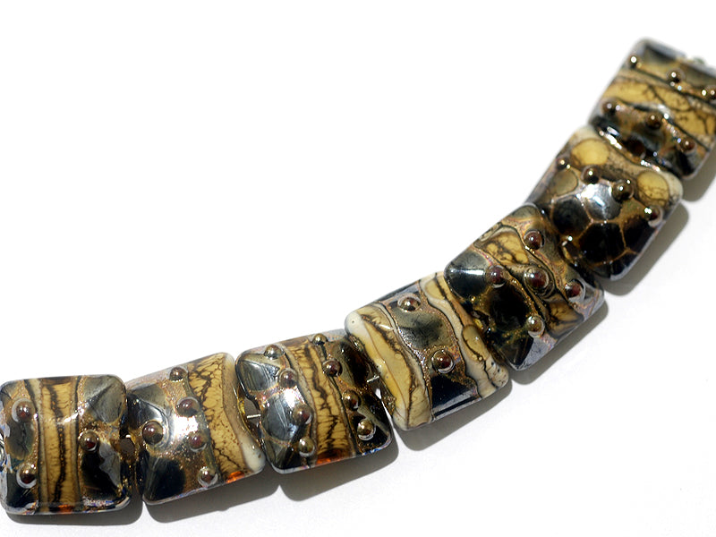 10800804 - Seven Black w/Yellow Silver Foil Pillow Beads