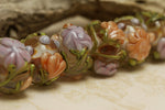 10801001 - Seven Light Pink w/Orange Floral Rondelle Beads