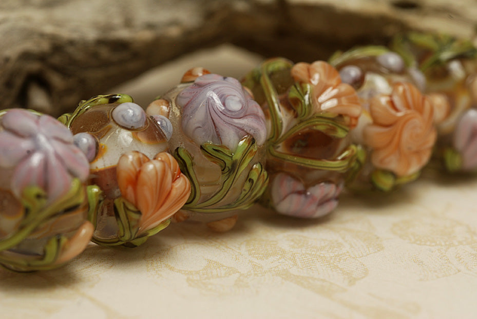 10801001 - Seven Light Pink w/Orange Floral Rondelle Beads