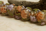 10801001 - Seven Light Pink w/Orange Floral Rondelle Beads