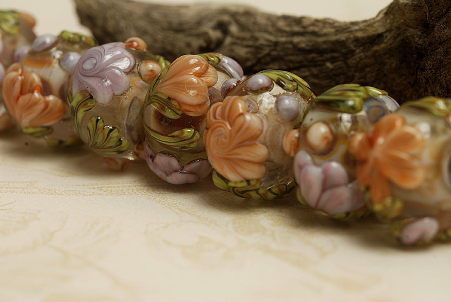 10801001 - Seven Light Pink w/Orange Floral Rondelle Beads