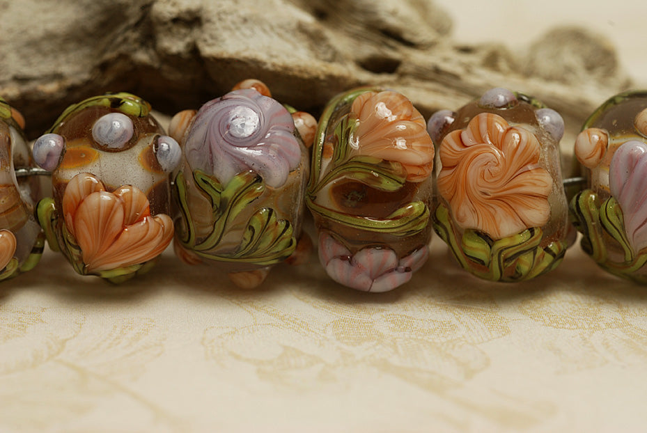 10801001 - Seven Light Pink w/Orange Floral Rondelle Beads