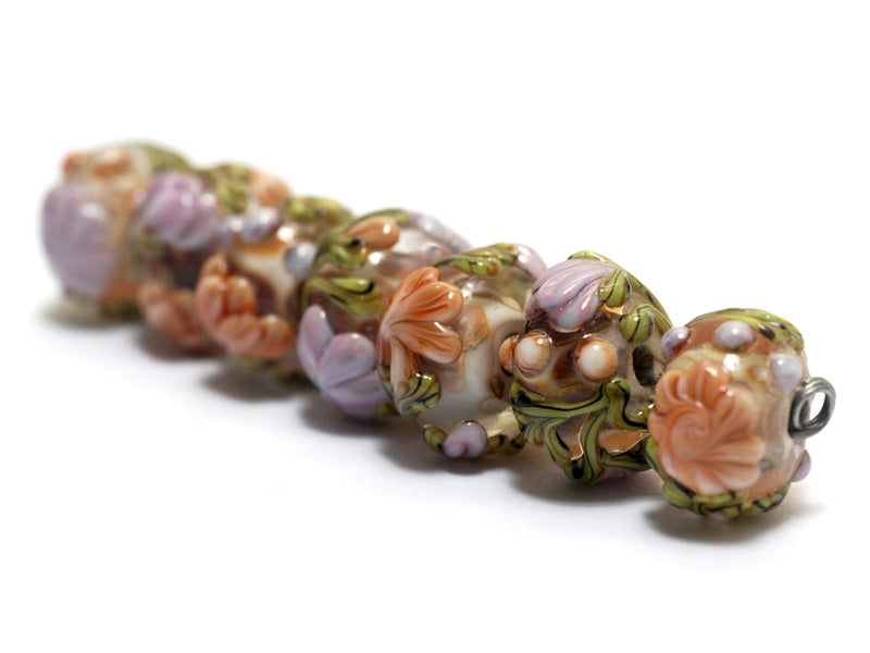 10801001 - Seven Light Pink w/Orange Floral Rondelle Beads