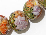 10801002 - Seven Light Pink w/Orange Floral Lentil Beads