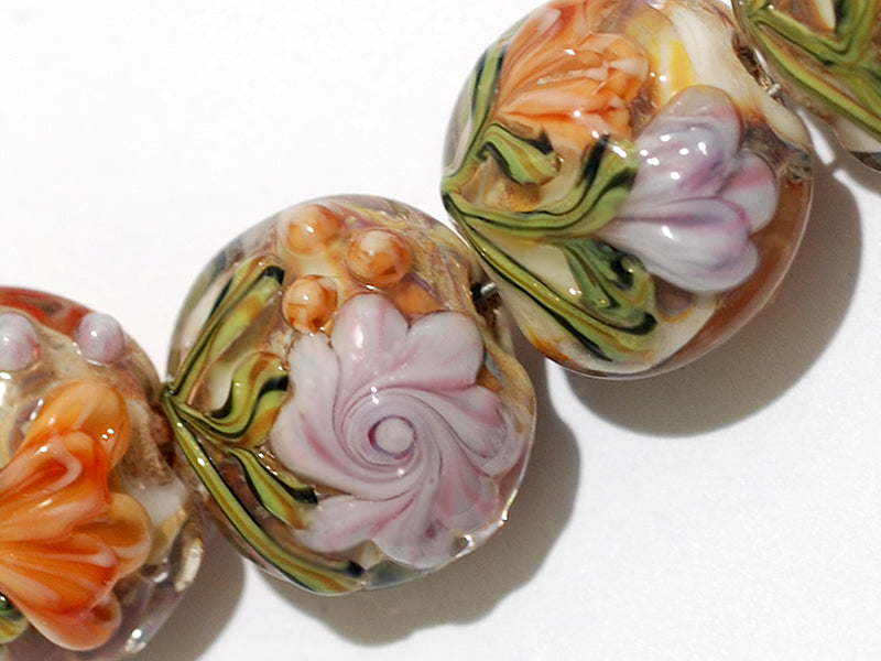 10801002 - Seven Light Pink w/Orange Floral Lentil Beads