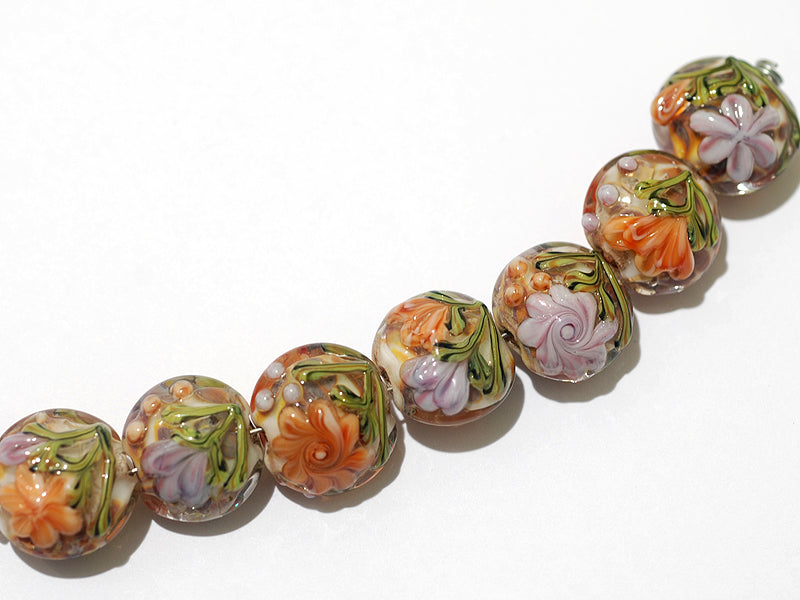10801002 - Seven Light Pink w/Orange Floral Lentil Beads