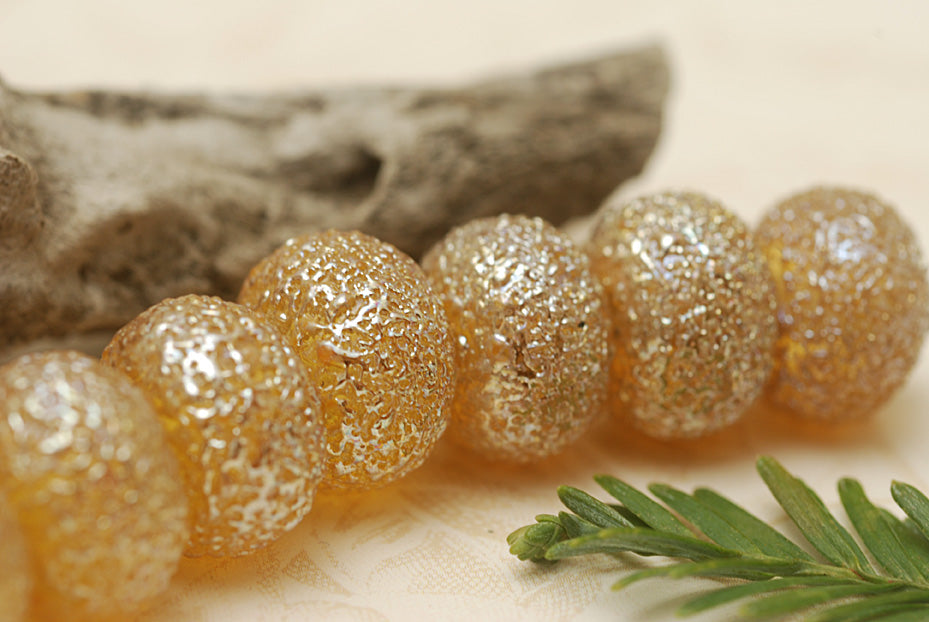 10801201 - Seven Golden Yellow Metallic Rondelle Beads