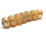 10801201 - Seven Golden Yellow Metallic Rondelle Beads