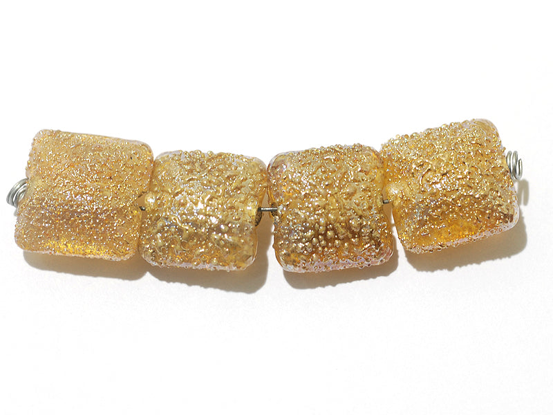 10801214 - Four Golden Yellow Metallic Pillow Beads