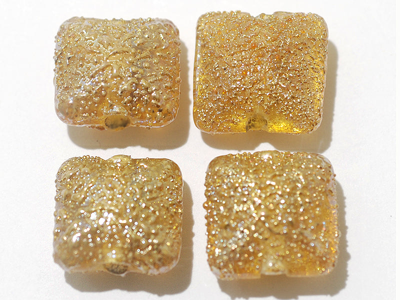 10801214 - Four Golden Yellow Metallic Pillow Beads
