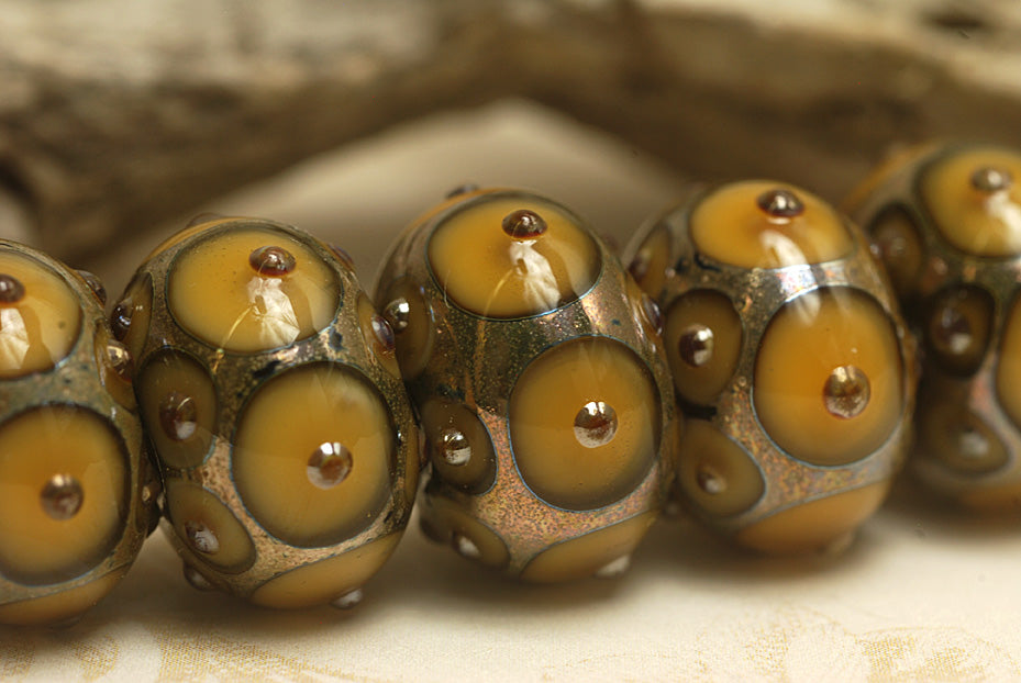 10801301 - Seven Butterscotch w/Metal Dots Rondelle Beads