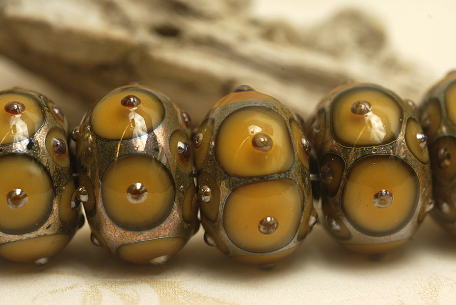 10801301 - Seven Butterscotch w/Metal Dots Rondelle Beads