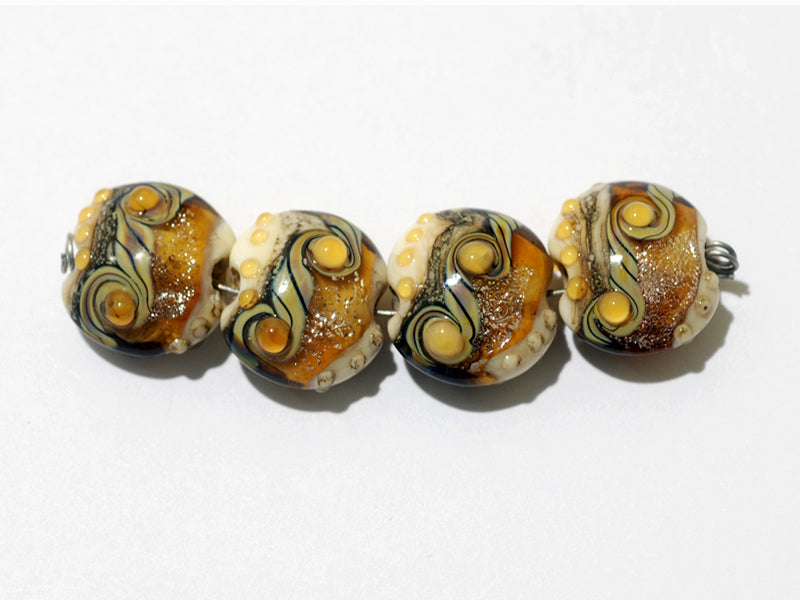 10801712 - Four Butterscotch Stardust Lentil Beads
